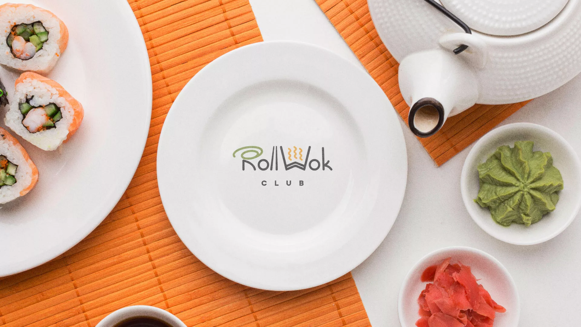 Разработка логотипа и фирменного стиля в Соликамске для суши-бара «Roll Wok Club»